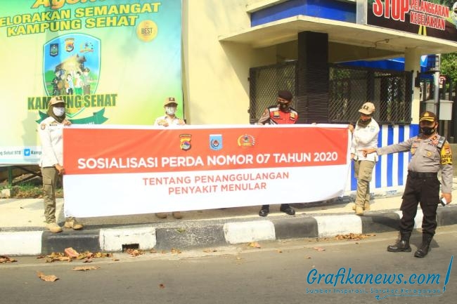TNI Polri Turun Jalan Sosialisasikan Sanksi Warga Tak Memakai Masker